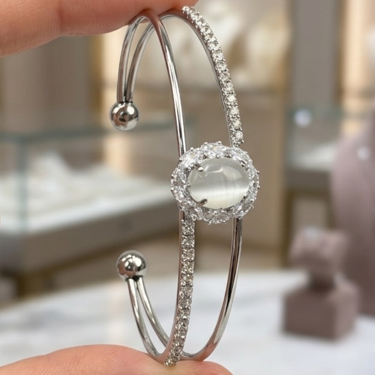 Elegant Double Band Bangle With Center Stone