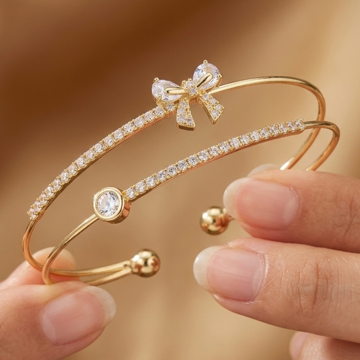 Elegant Golden-Tone Bow And Crystal Ladies Bangles