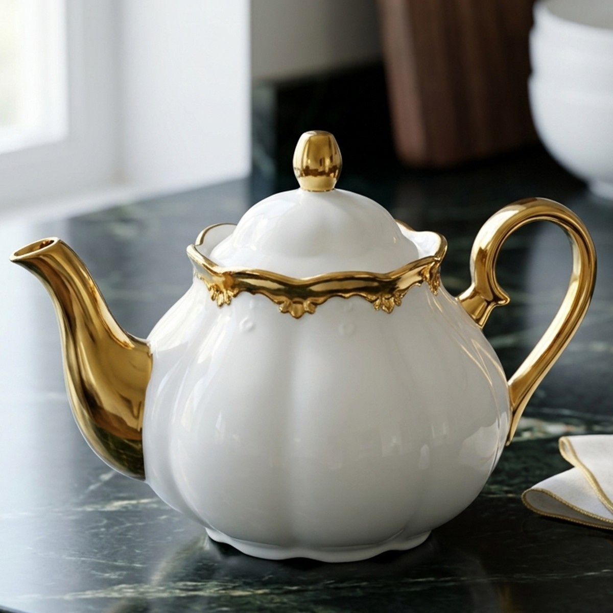 Ceramic Teapot with Golden Accents